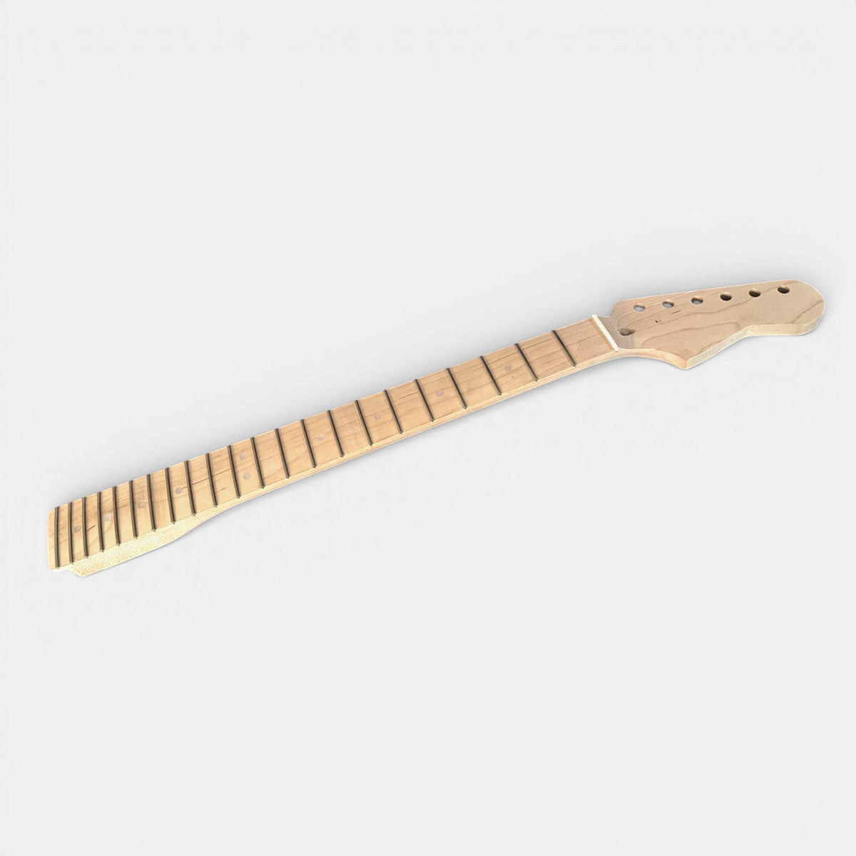Guitar neck made of Maple laid flat on a white background