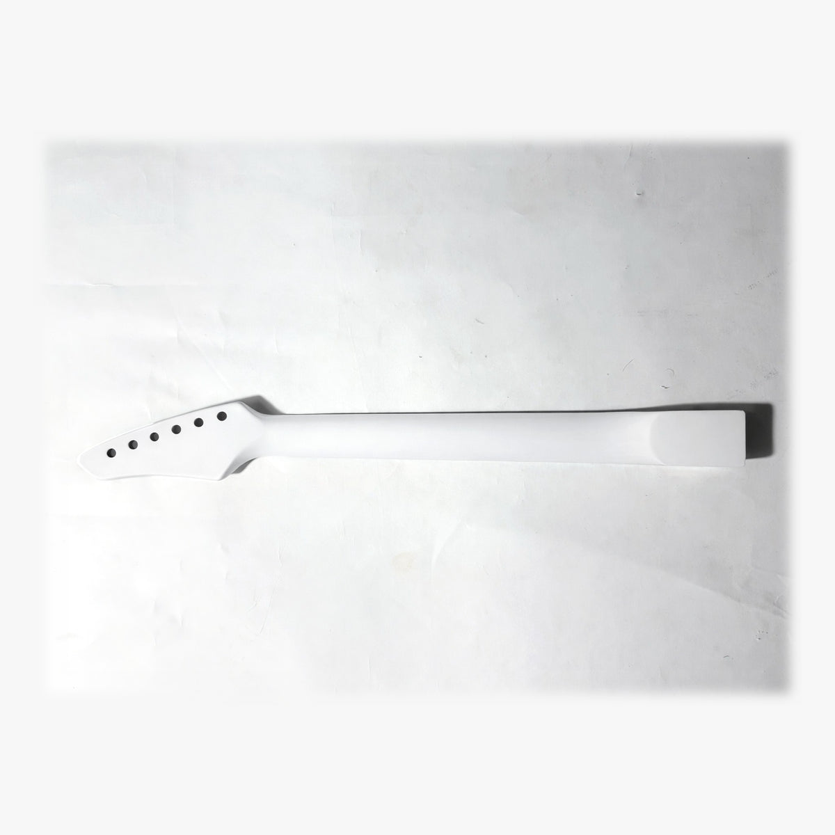 Back of the sword headstock guitar neck in white matt paint