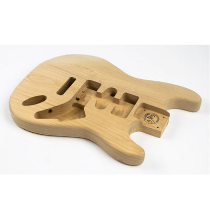 Strat Alder body side angle displaying contoured waist and all internal routing channels