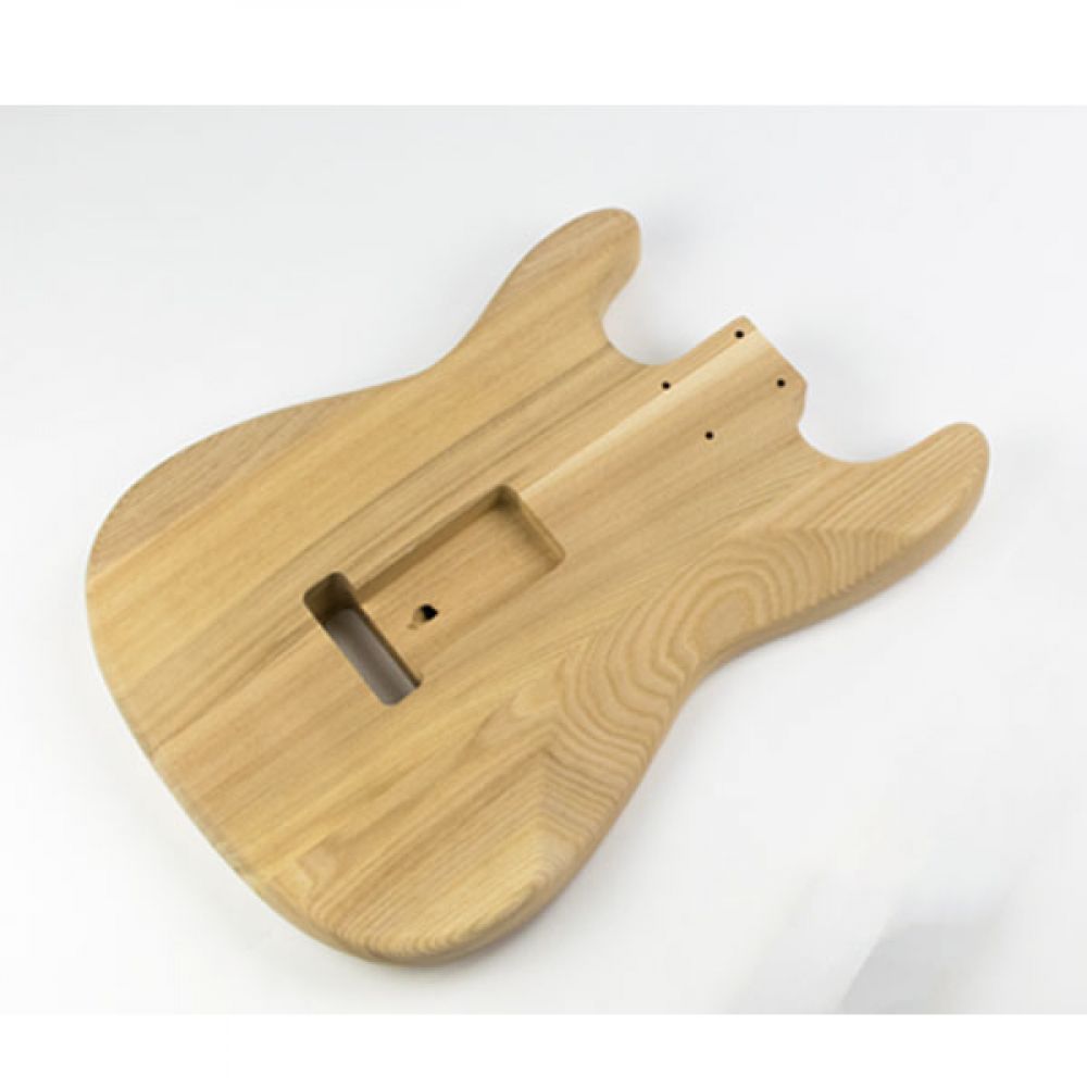 ST Ash guitar body back view displaying smooth carved surface with neck pocket routing on natural ash wood