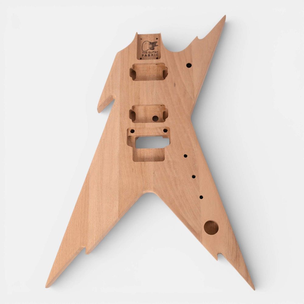 Front-facing unfinished mahogany body with The Guitar Fabrik branding, showing all cavity and hardware mounting holes