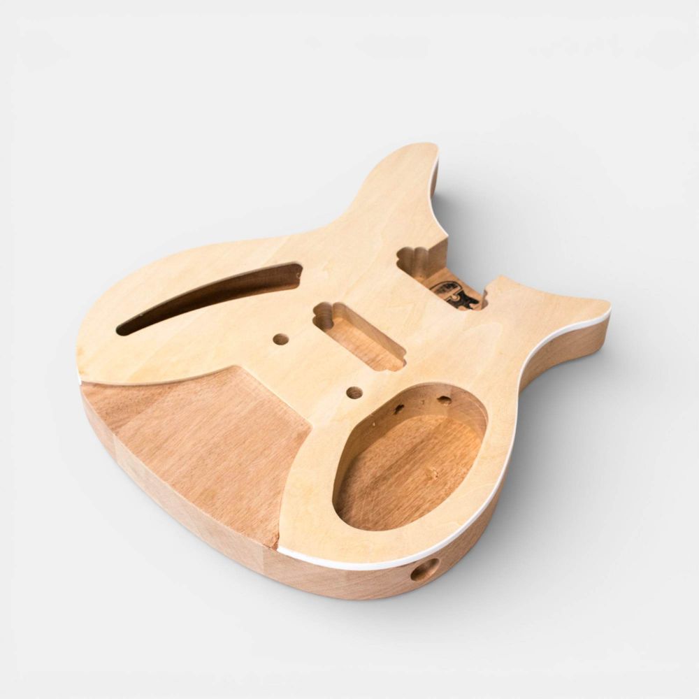 Semi-hollow mahogany body cutaway view showing internal cavities and f-hole detail.