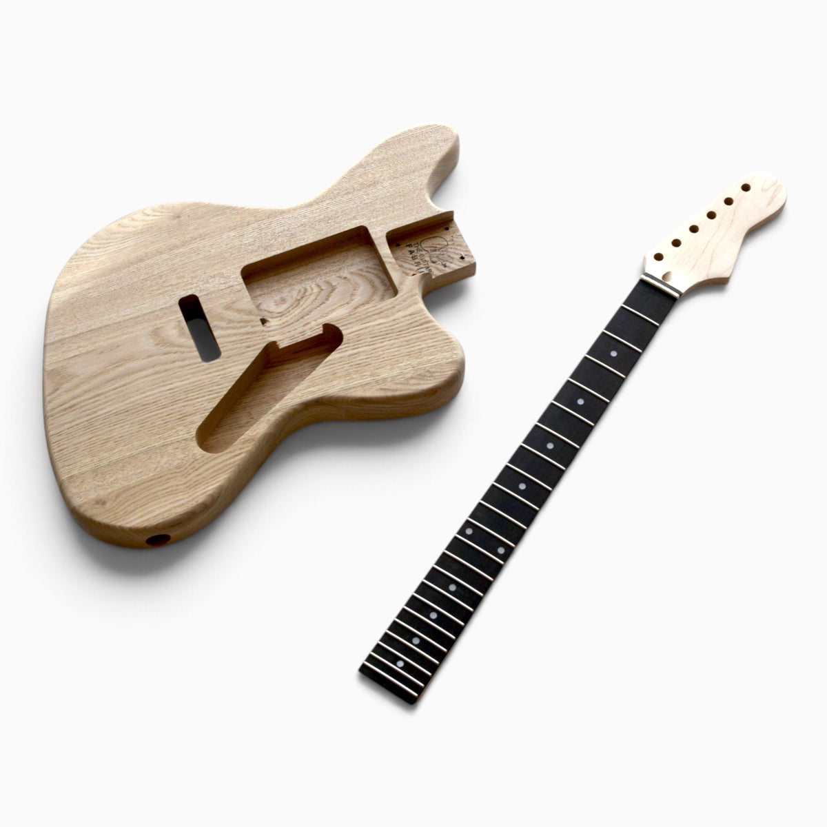 Unfinished solid ash body next to the bolt-on maple neck with ebony fretboard, 22 frets and white dot inlays