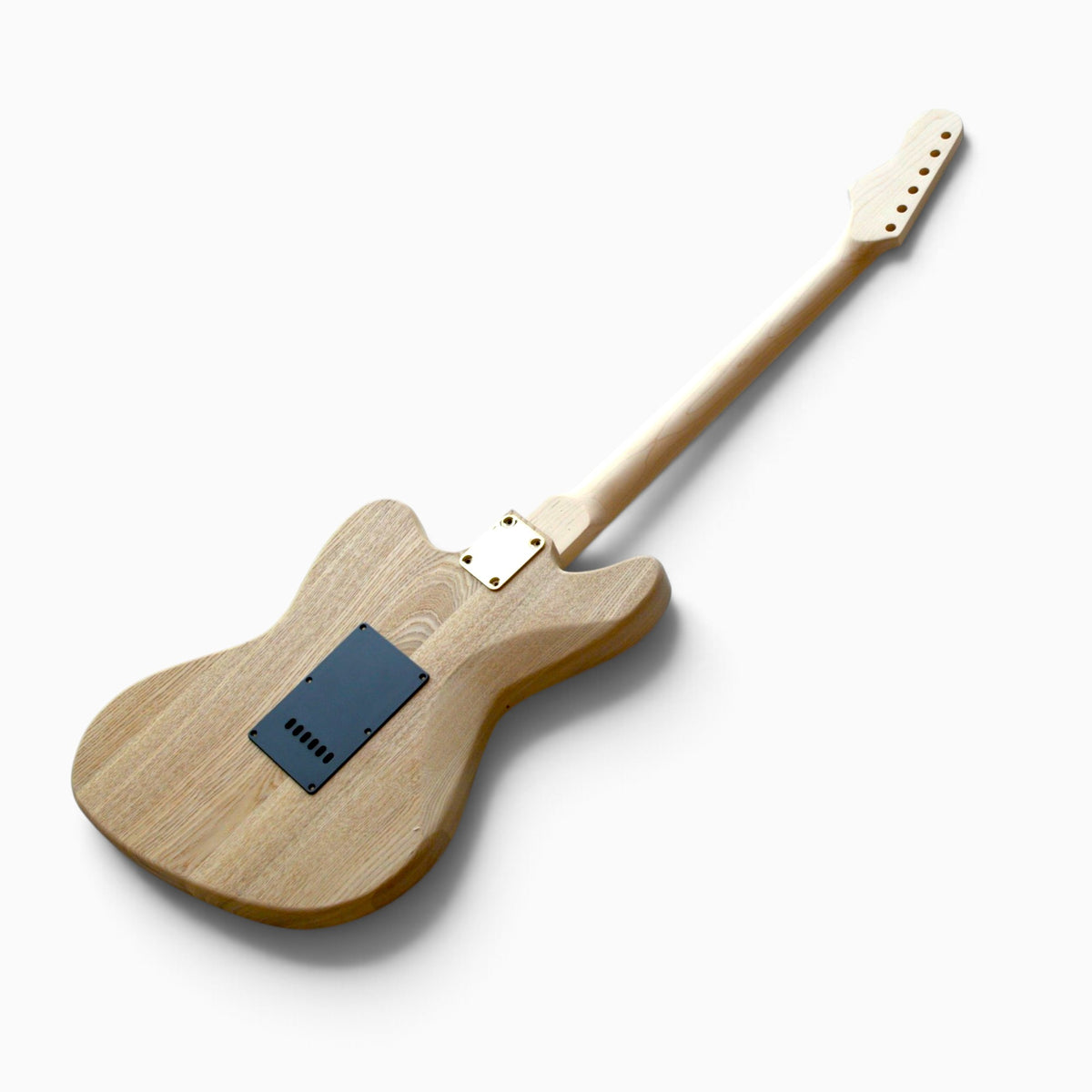 Back of the ash body with black cavity cover and the bolt-on maple neck attached, before finishing