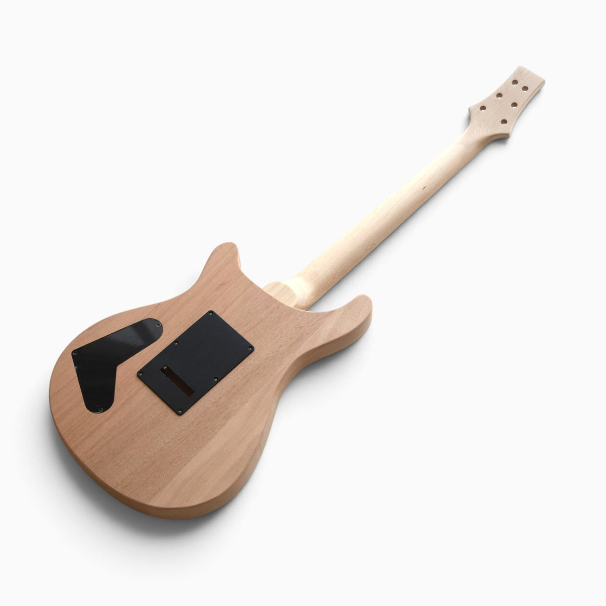 Back of the assembled kit with black tremolo cover and control cover fitted on the mahogany body