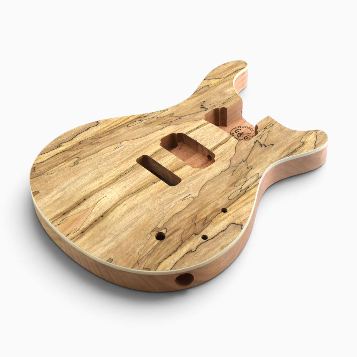 Angled view of the unfinished spalted maple top with cream edge, pickup routes and output jack hole