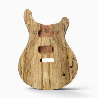 Front of the raw spalted maple veneer body with neck pocket, humbucker routes, tremolo slot and control holes