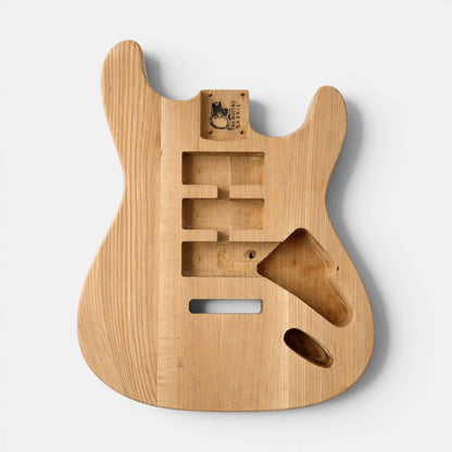 Unfinished raw solid ash wood Strat style guitar body with pre-cut slots