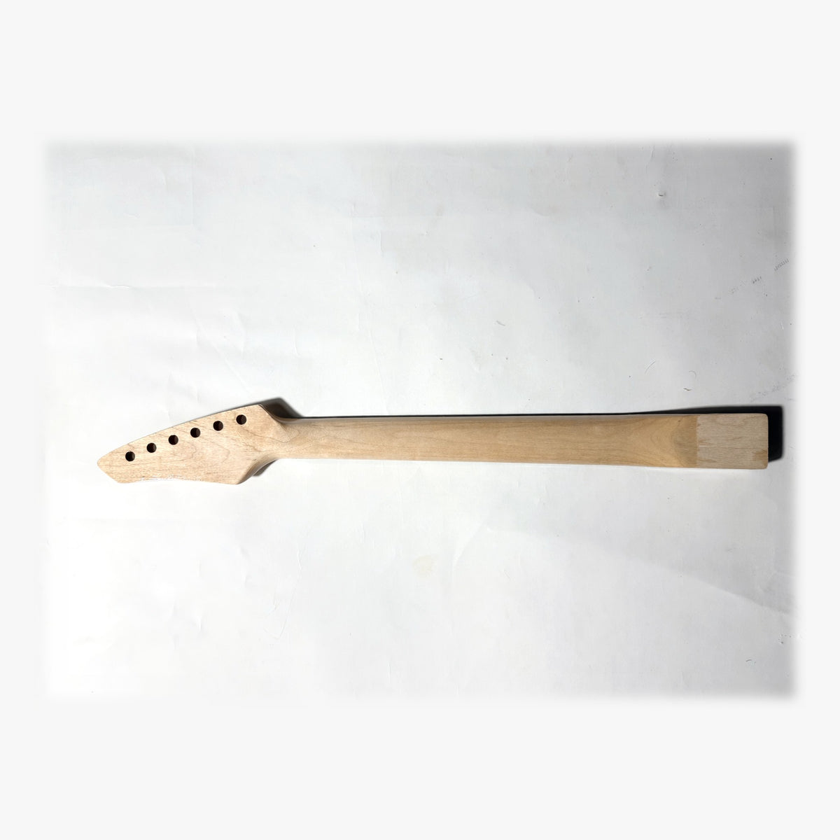 Back of the sword headstock guitar neck in clear matt varnish