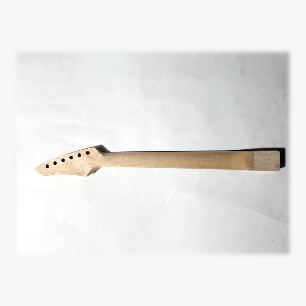 Back of the sword headstock guitar neck in clear satin varnish