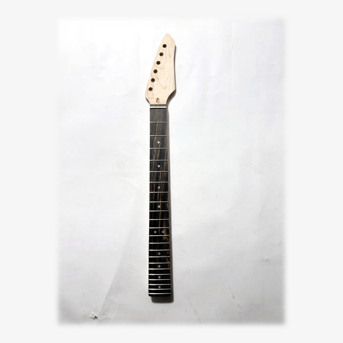 Sword headstock guitar neck in unfinished bare maple, front with the ebony fretboard