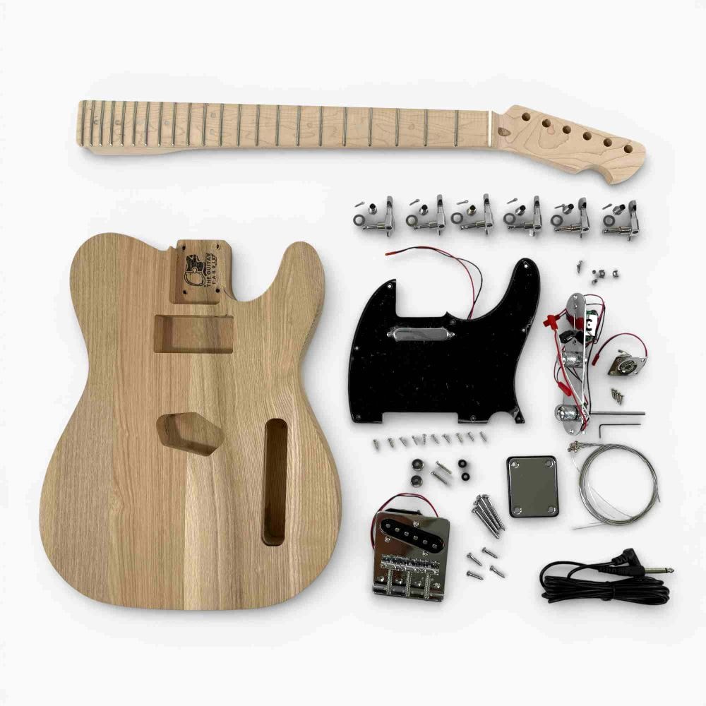 DIY Electric Guitar Kit TL Classic with unassembled ash body, maple neck, electronics, and hardware components laid flat