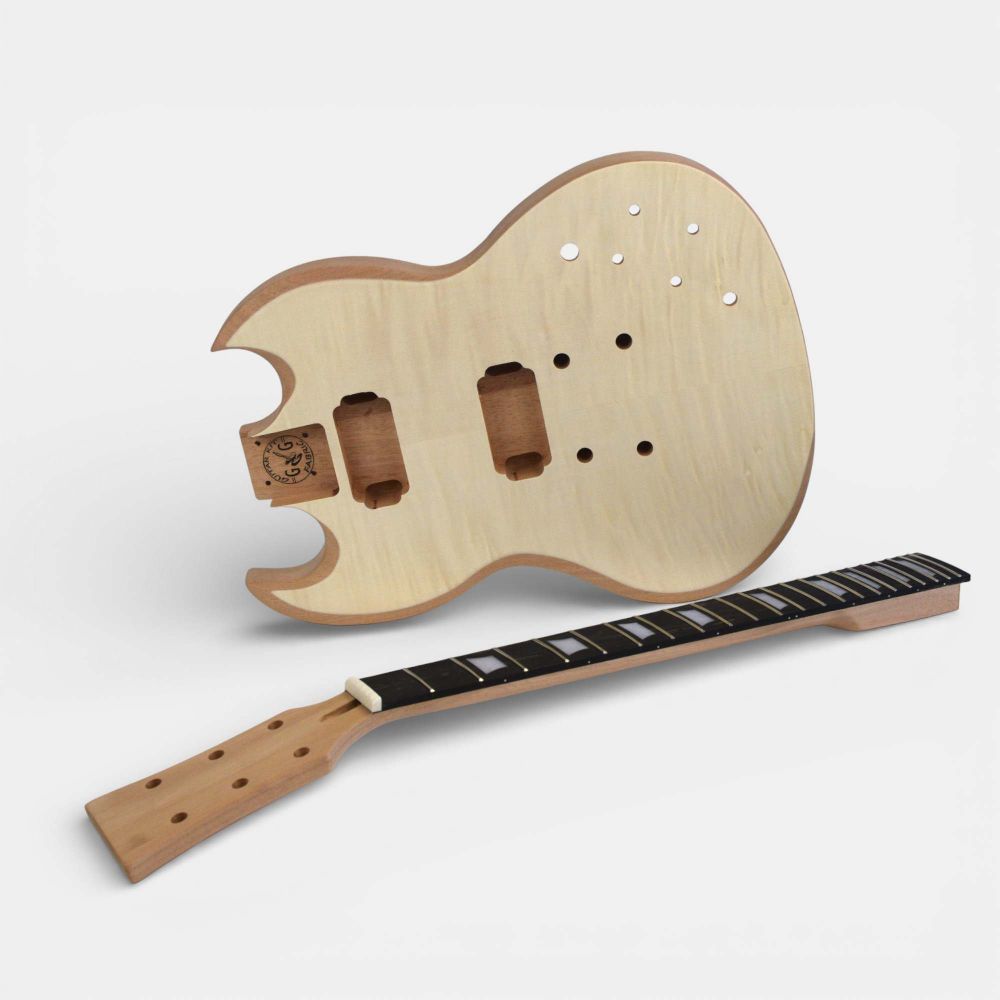 Solid-G guitar body and neck from angled view, displaying double-cut design and ebony fretboard with trapeze inlays.