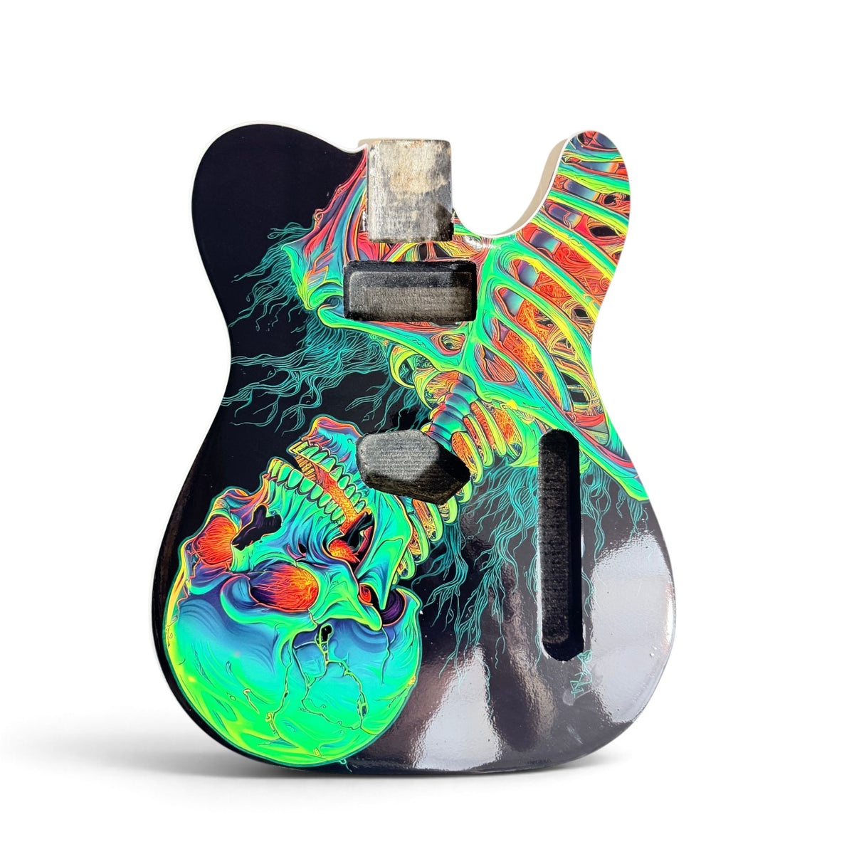 TL-style guitar body with a guitar skin applied under white binding