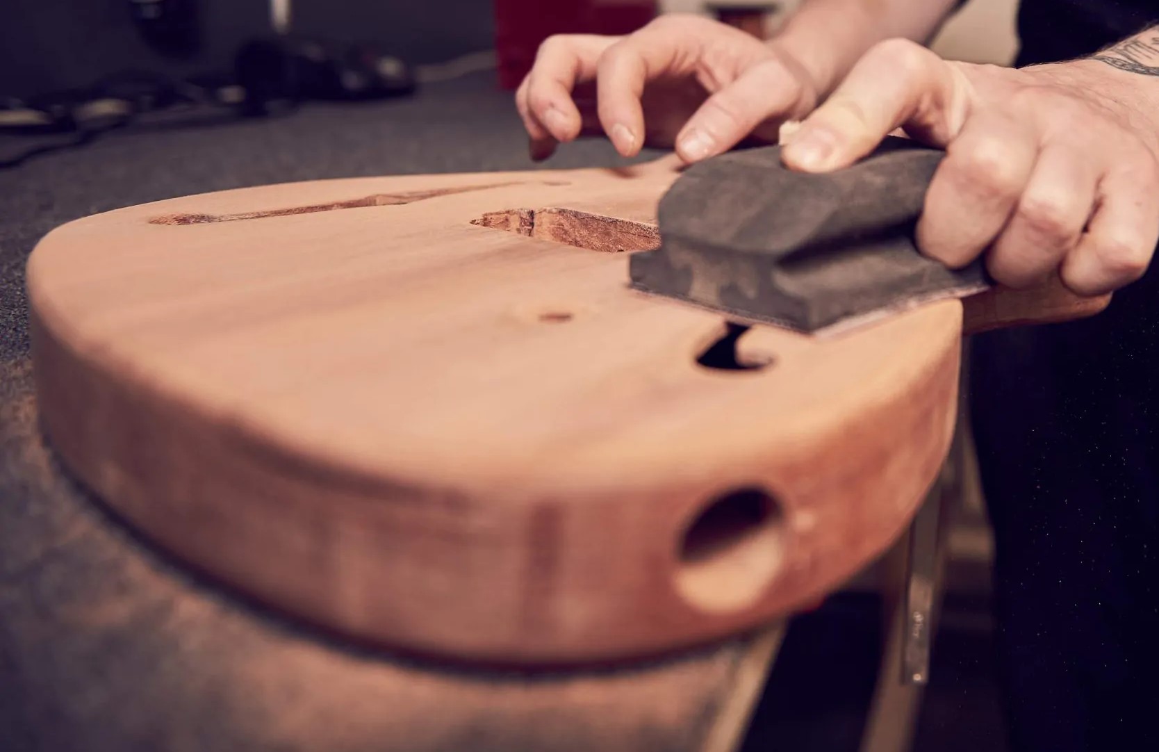 acoustic guitar sanding