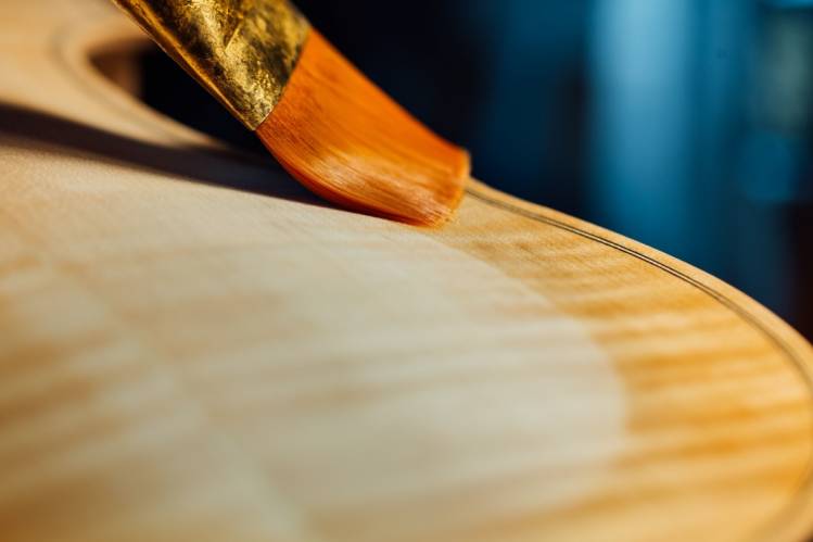 varnishing a guitar