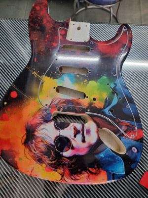 Peau de Jon Lennon sur Stratocaster